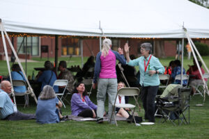 A gathering at a class/cluster tent during Reunion.
