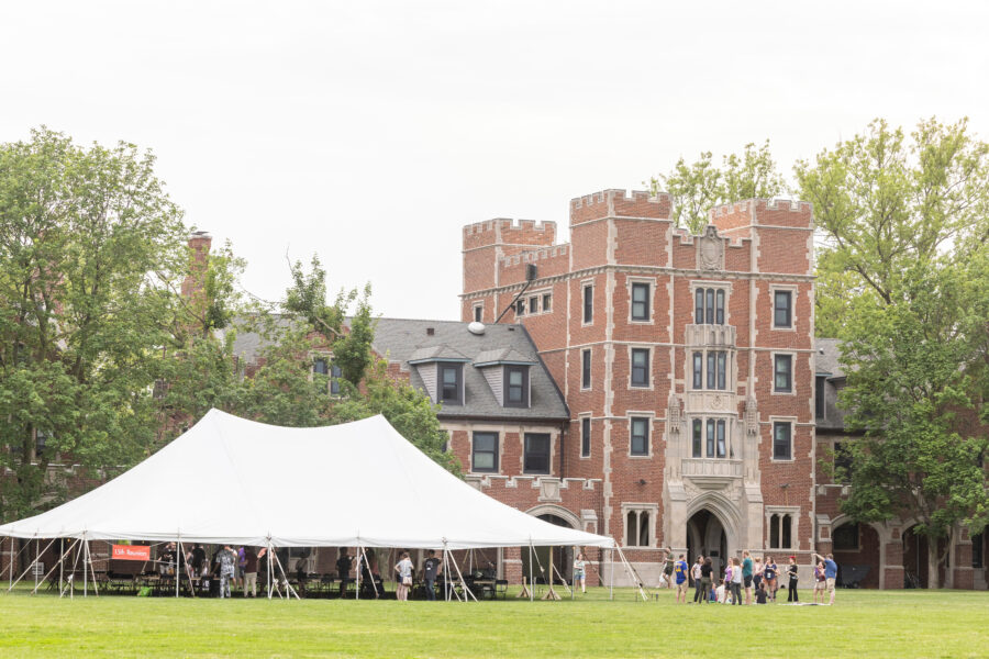 A large Reunion tent in front of Gates tower. (Photo by Justin Hayworth/Grinnell College)