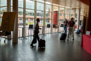Reunion guests in the JRC lobby on their way to the check-in desk, which is across from Spencer Grill.