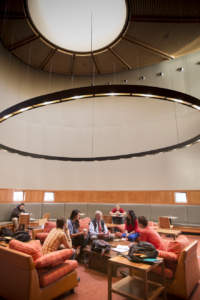 View of Laurel Leaf Lounge with President Emeritus and Professor Emeritus George Drake '56 joining a student study group