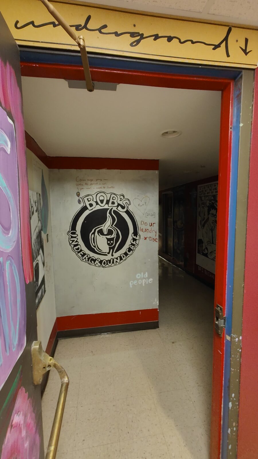 Entrance to Bob's Underground from door to turn in hallway.