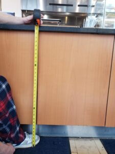Grill counter height: about 2 feet and 9 3/4 inches from floor to top of counter