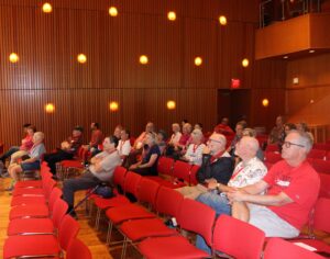 A Reunion presentation in JRC 101 with audience-style seating.