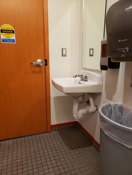 Close proximity of sink to exit door
