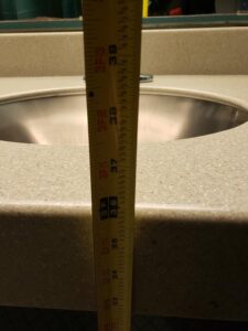 Sink height: about 32 3/4 inches to base, 36 inches to top