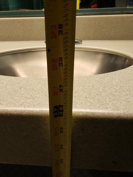 Sink height: about 32 3/4 inches to base, 36 inches to top
