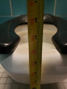Toilet height in non-accessible stalls: about 16.5 inches