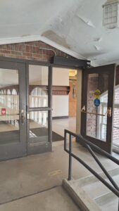 Entrance to Main Hall from top of ramp and stairs in the South Loggia.