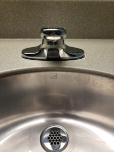 Motion sensor sink faucet
