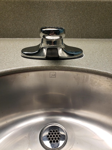 Motion sensor sink faucet
