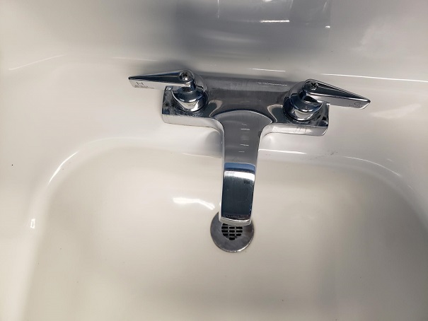 Faucet style: 2 handles, pull towards you