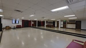 View of Gardner lounge facing southeast, with doors to Freesound and Bob's Underground far wall (left), doors to elevator and stairs on far wall (right)